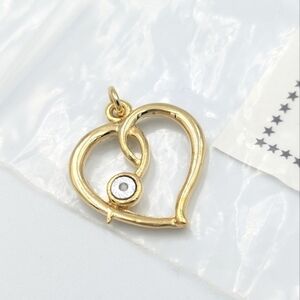 Vintage diamond chip gold tone heart pendant with original info